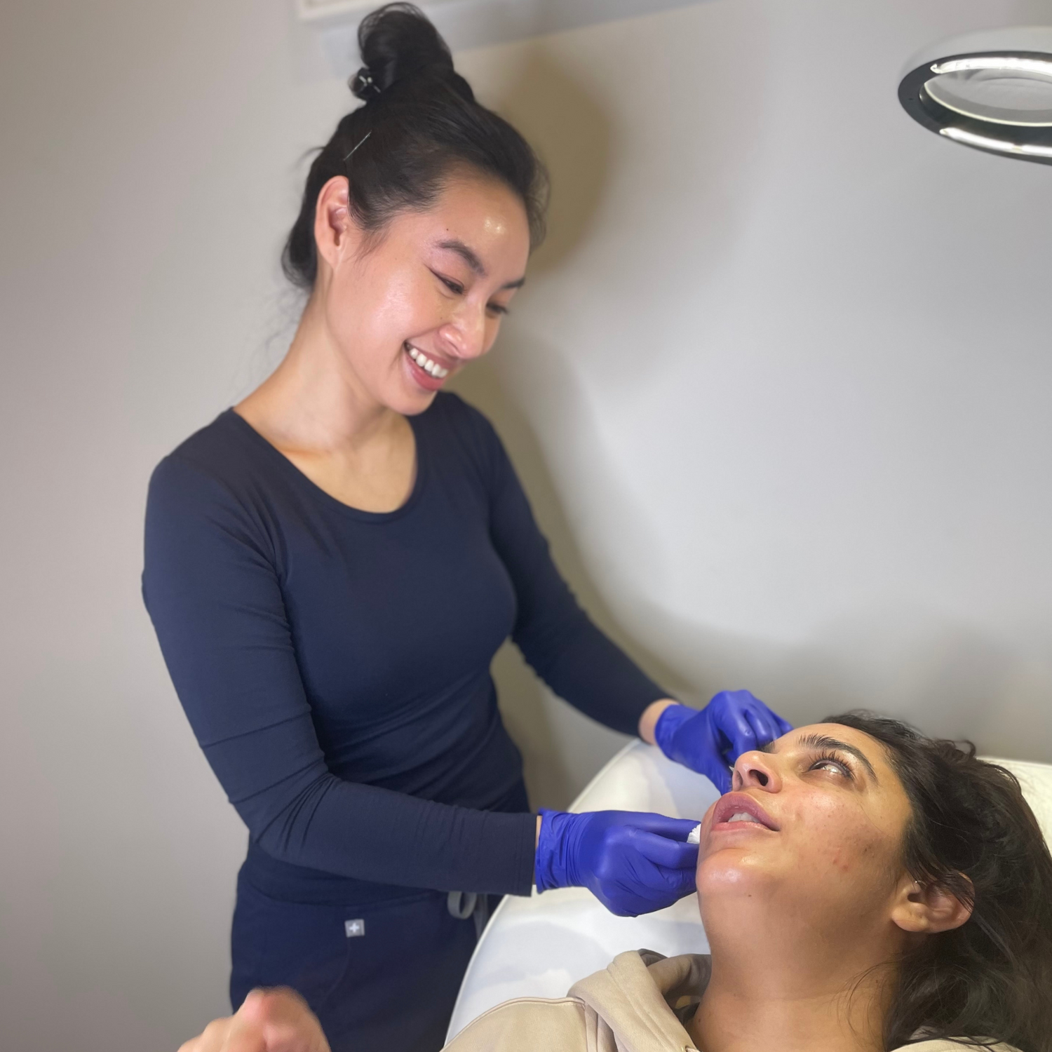 Dr Vy with a Dermal Filler patient at our central London aesthetic clinic.